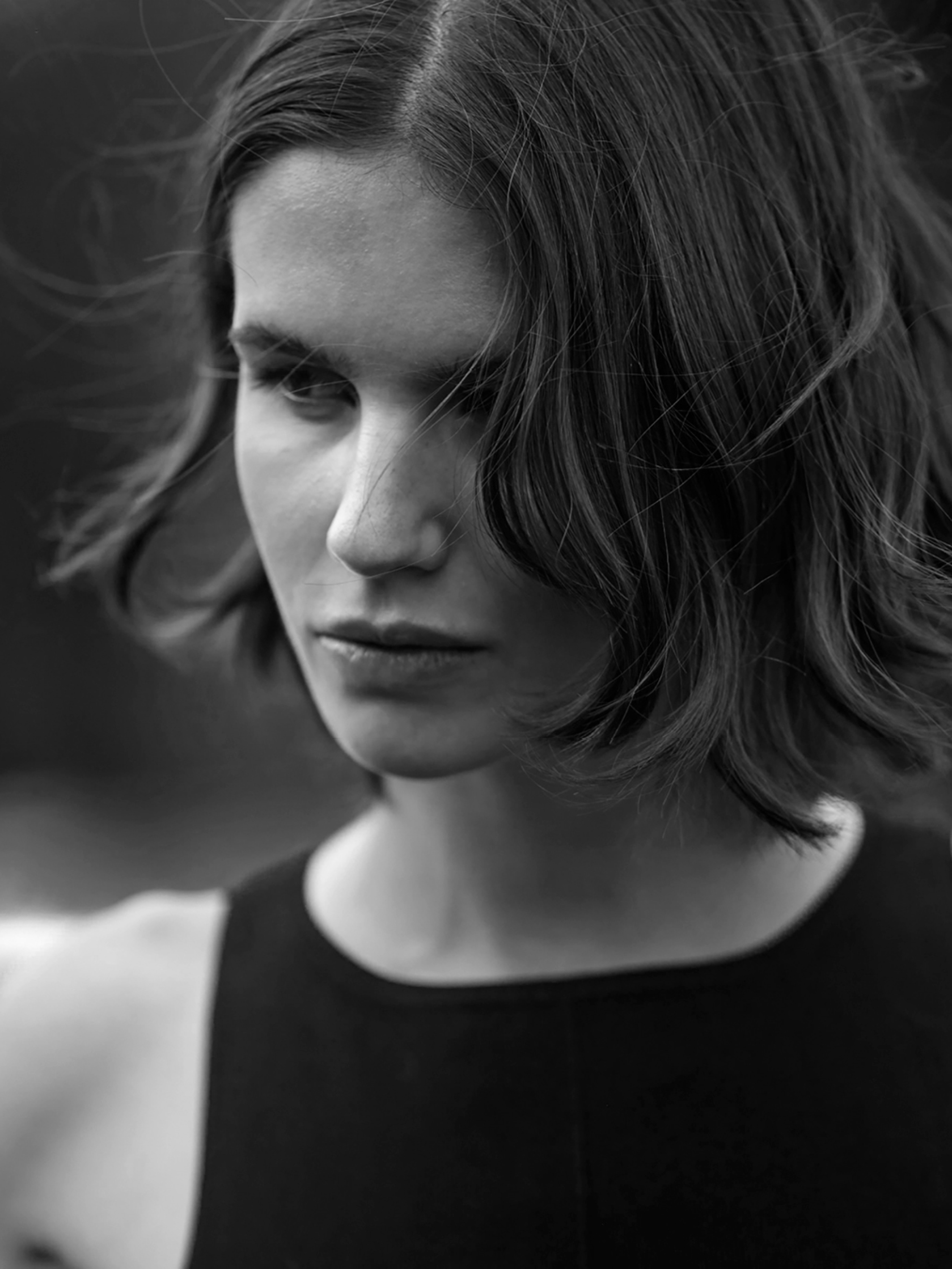 close up on woman black and white
